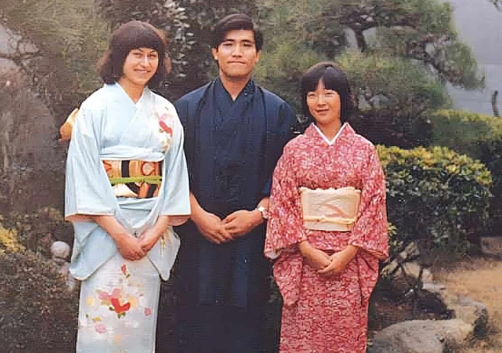 Lesley trying in a traditonal kimono on during her first visit to Japan